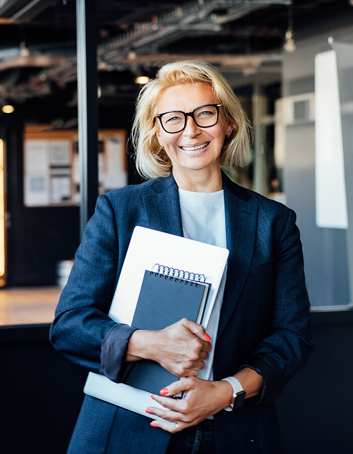 Happy 50s confident mature businesswoman middle ag YJASRBA.jpg